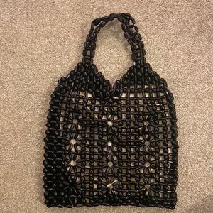 Wood beaded handbag